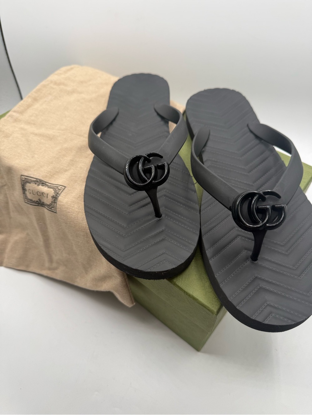 Gucci Men’s Black Rubber GG Logo Flip-Flops